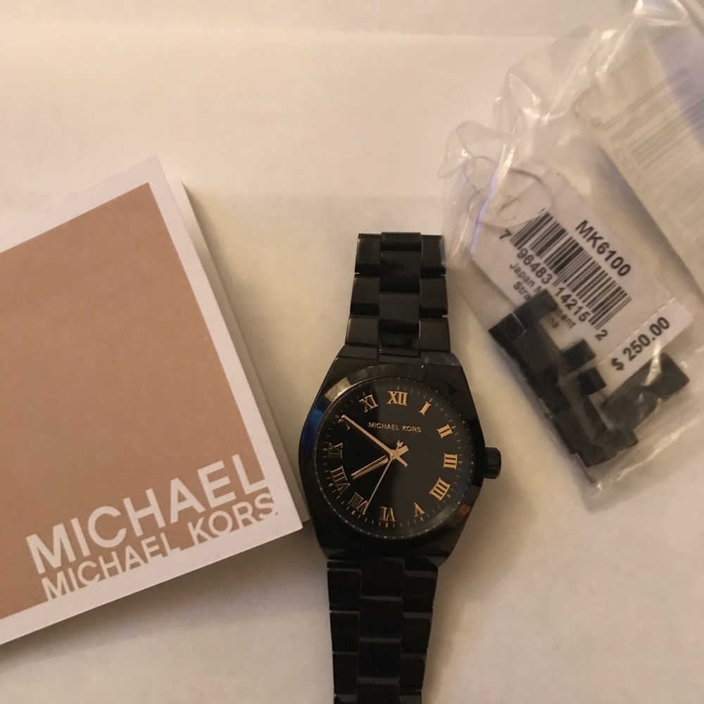 NWT.  Michael Kors female watch.